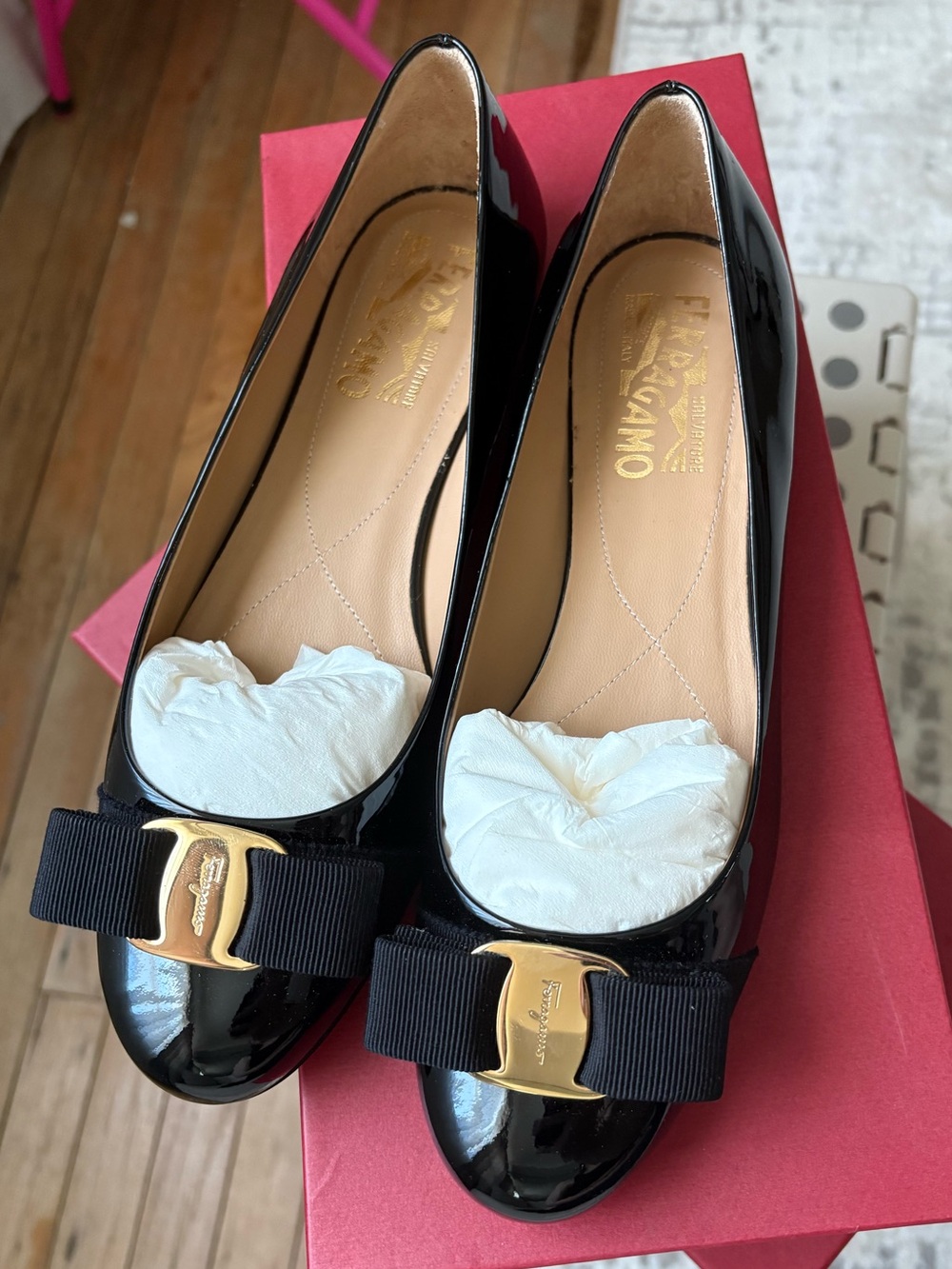 Salvatore Ferragamo Black Patent Varina Bow Flats with Gold Hardware